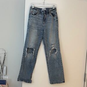 Women's Distressed Blue Jeans